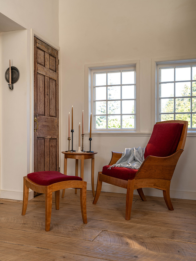 wing chair in cherry with red velvet upholstery